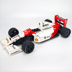 1:8 Woking Hypercar MP4 F1 Racing | Machine de Grand Prix Rouge et Blanche de 1988 (2800 pièces)
