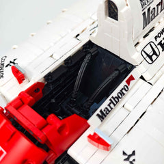 1:8 Woking Hypercar MP4 F1 Racing | Machine de Grand Prix Rouge et Blanche de 1988 (2800 pièces)