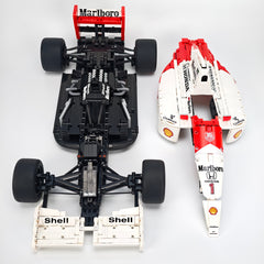 1:8 Woking Hypercar MP4 F1 Racing | Machine de Grand Prix Rouge et Blanche de 1988 (2800 pièces)